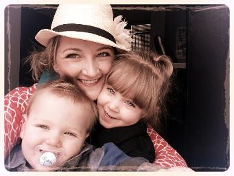 Alison Seipp hugging her two children Clara and Emmett